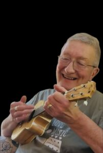 Pastor Jerry O'Neill playing ukulele